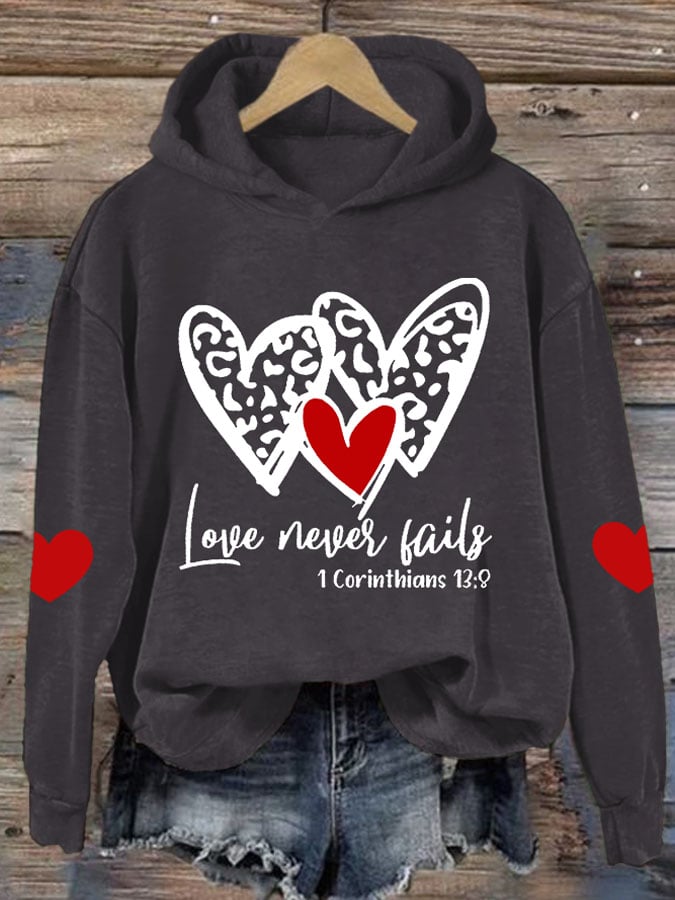 Women's Love Never Fails Heart Printed Sweatshirt