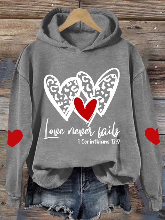 Women's Love Never Fails Heart Printed Sweatshirt