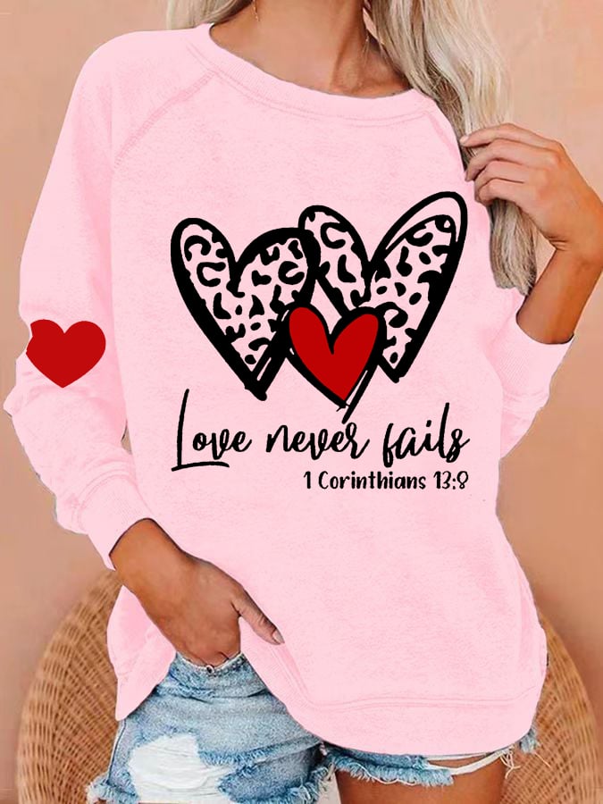 Women's Love Never Fails Heart Print Round Neck Sweatshirt