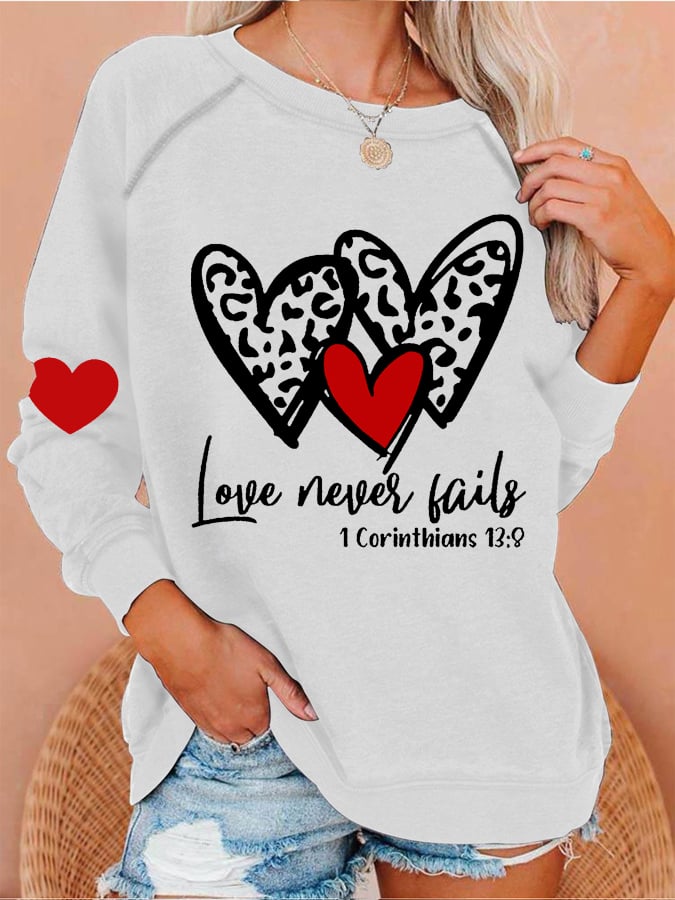 Women's Love Never Fails Heart Print Round Neck Sweatshirt