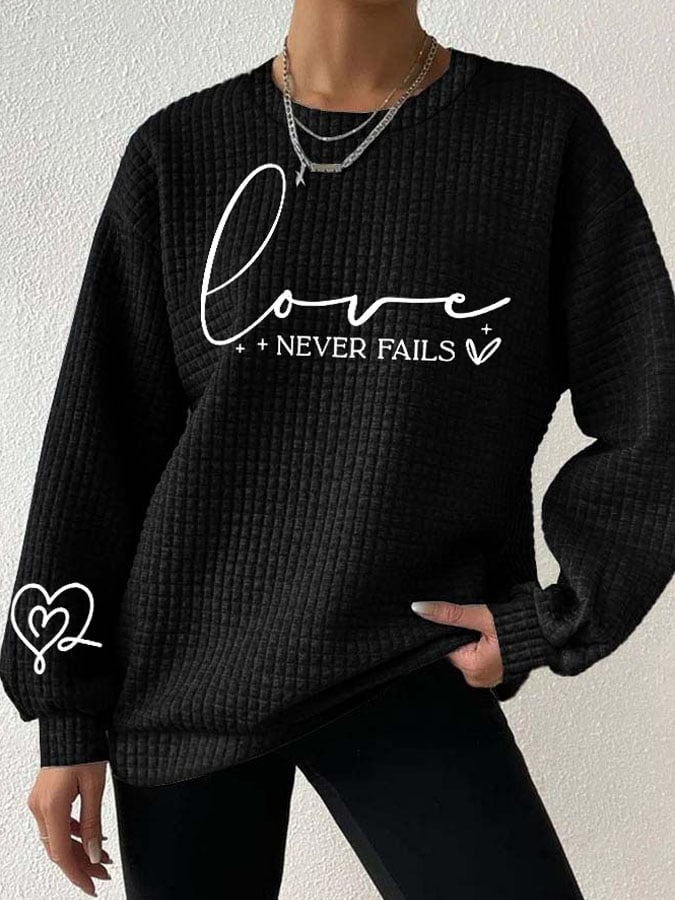 Women's Love Never Fails Heart Print Long Sleeve Sweatshirt