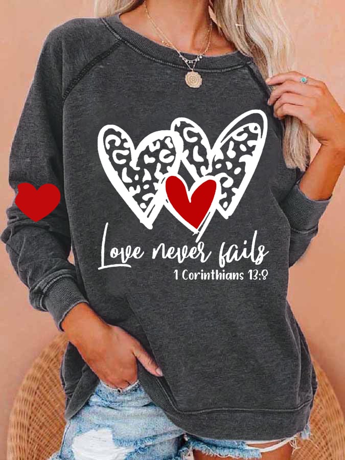 Women's Love Never Fails Heart Print Round Neck Sweatshirt