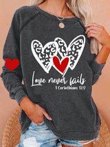 Women's Love Never Fails Heart Print Round Neck Sweatshirt