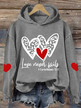 Women's Love Never Fails Heart Printed Sweatshirt