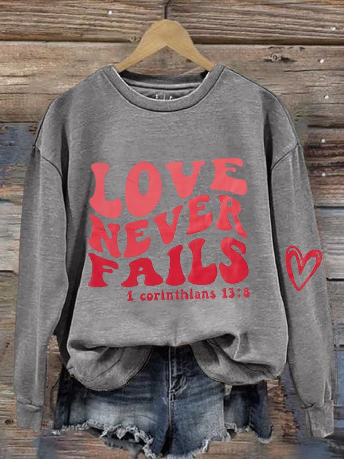 Women's Love Never Fails Print Sweatshirt