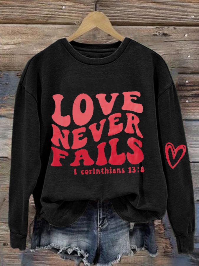 Women's Love Never Fails Print Sweatshirt