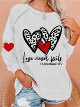 Women's Love Never Fails Heart Print Round Neck Sweatshirt