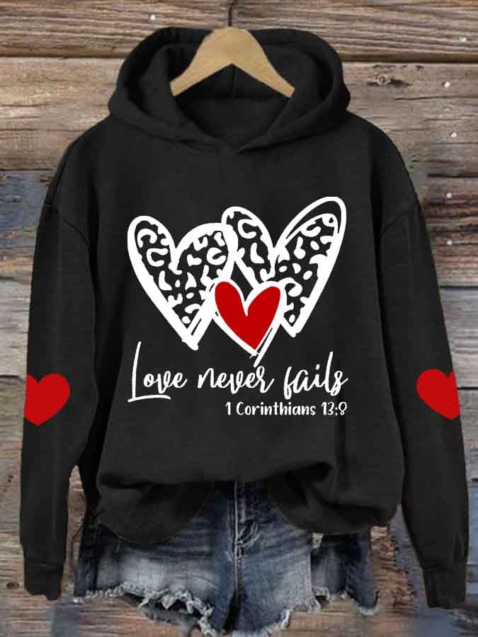 Women's Love Never Fails Heart Printed Sweatshirt